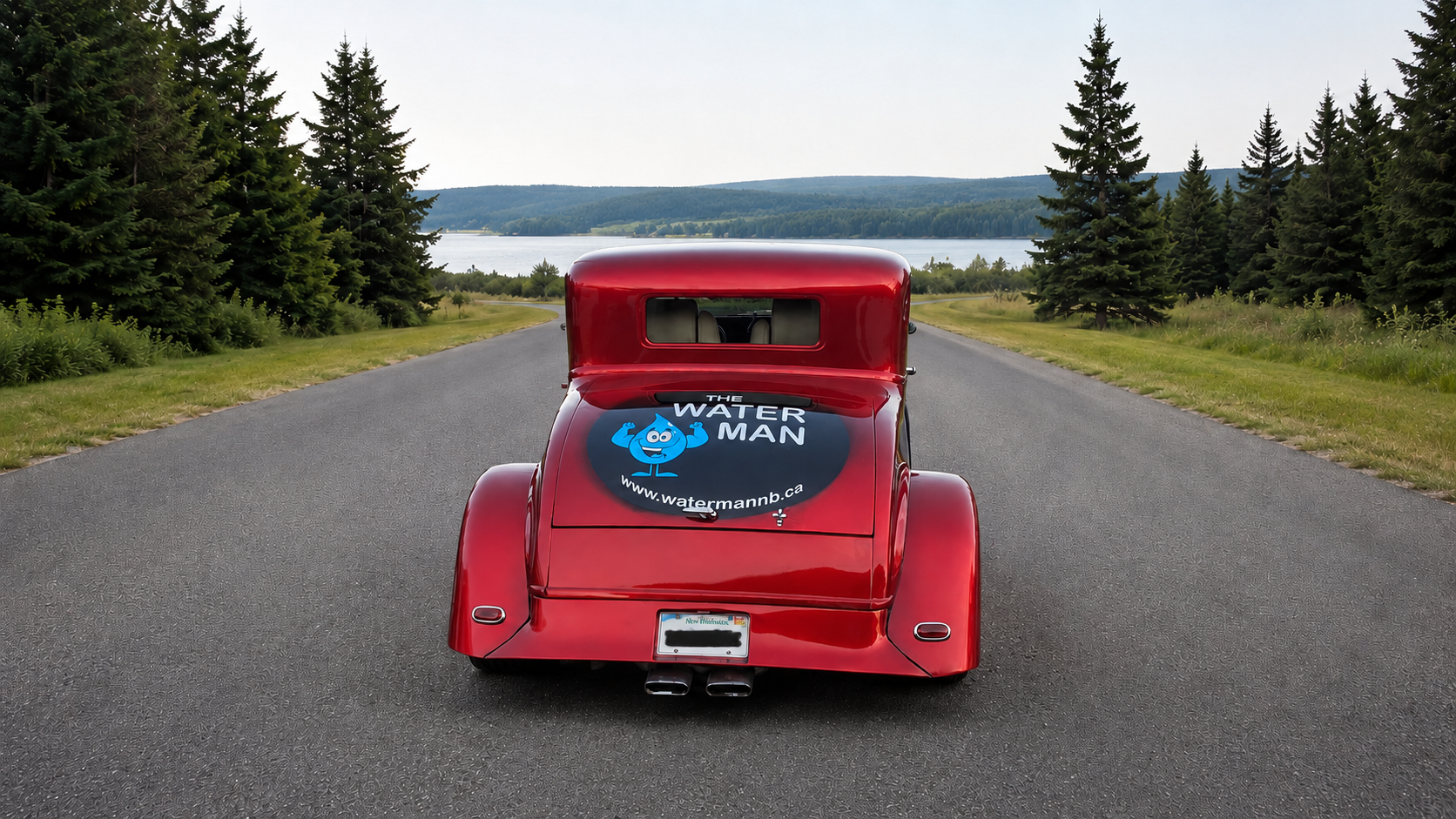 Water Man vintage car on a New Brunswick lakeside road The Water Man vintage car on a scenic New Brunswick lakeside road